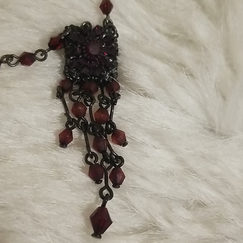 Ruby red colored necklace
